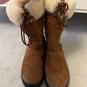 Slightly worn ugg boots with tie…fuzzy interior